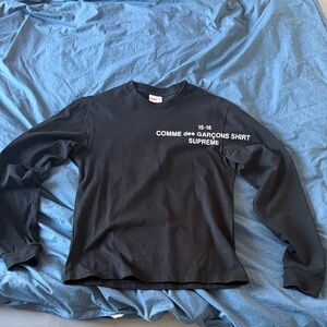 Supreme Black Long Sleeve Tee with White Comme des Garçons Text